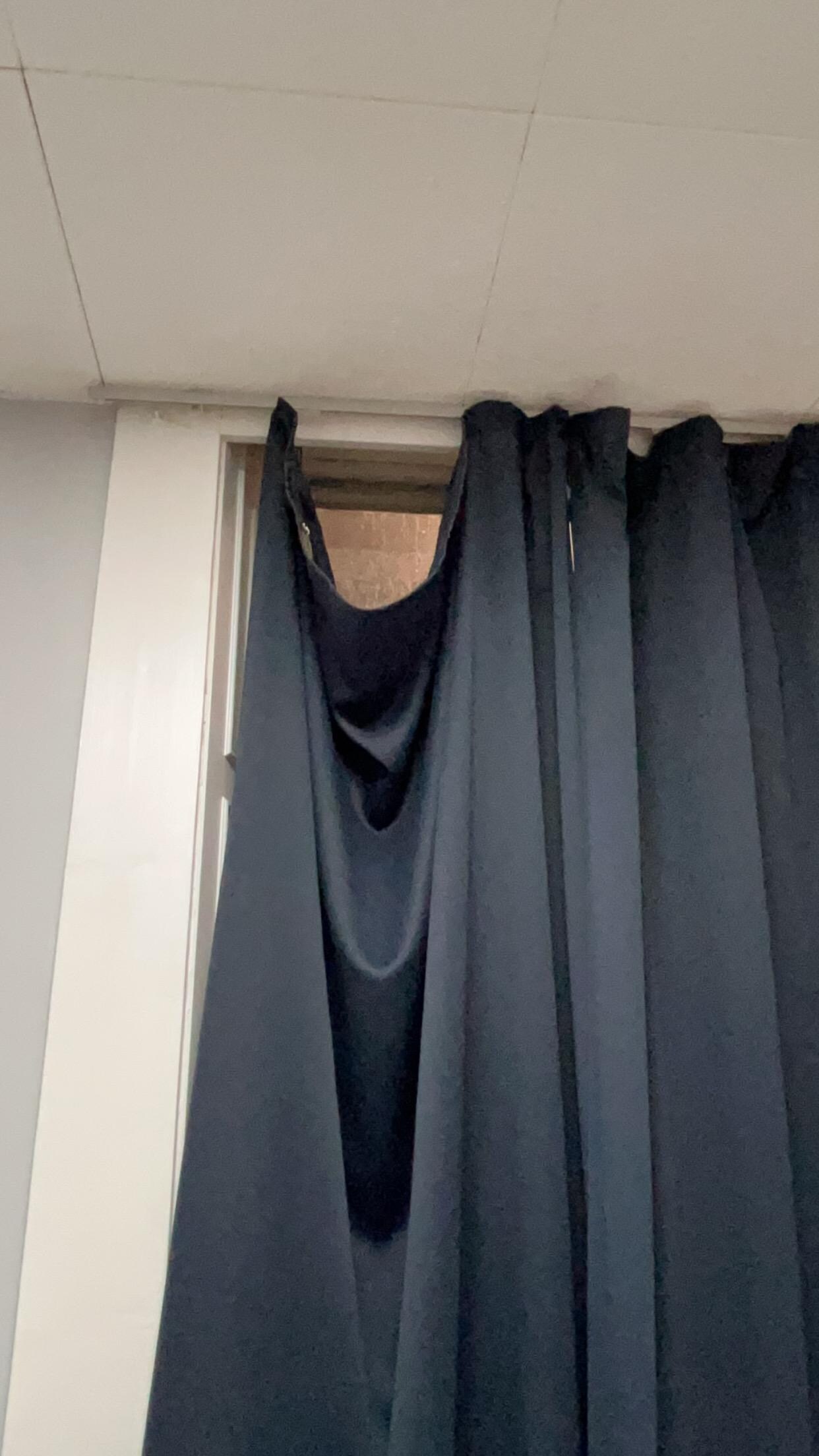 Curtains half hanging down