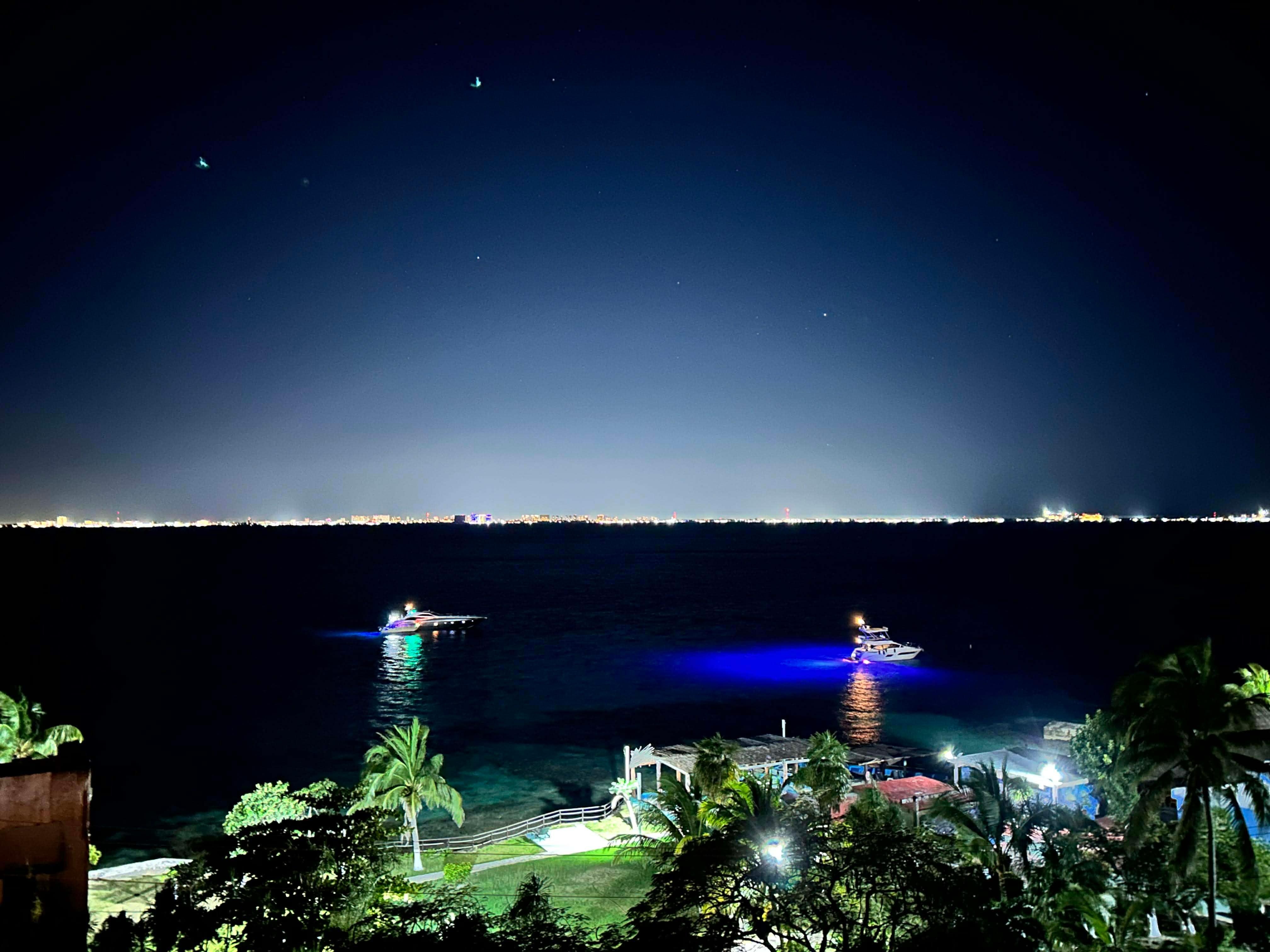 The view from the house of Cancun at night.
