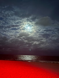 Photo from deck. Red light glow because red lights used by beachfront I hotels to protect sea turtle hatching!
