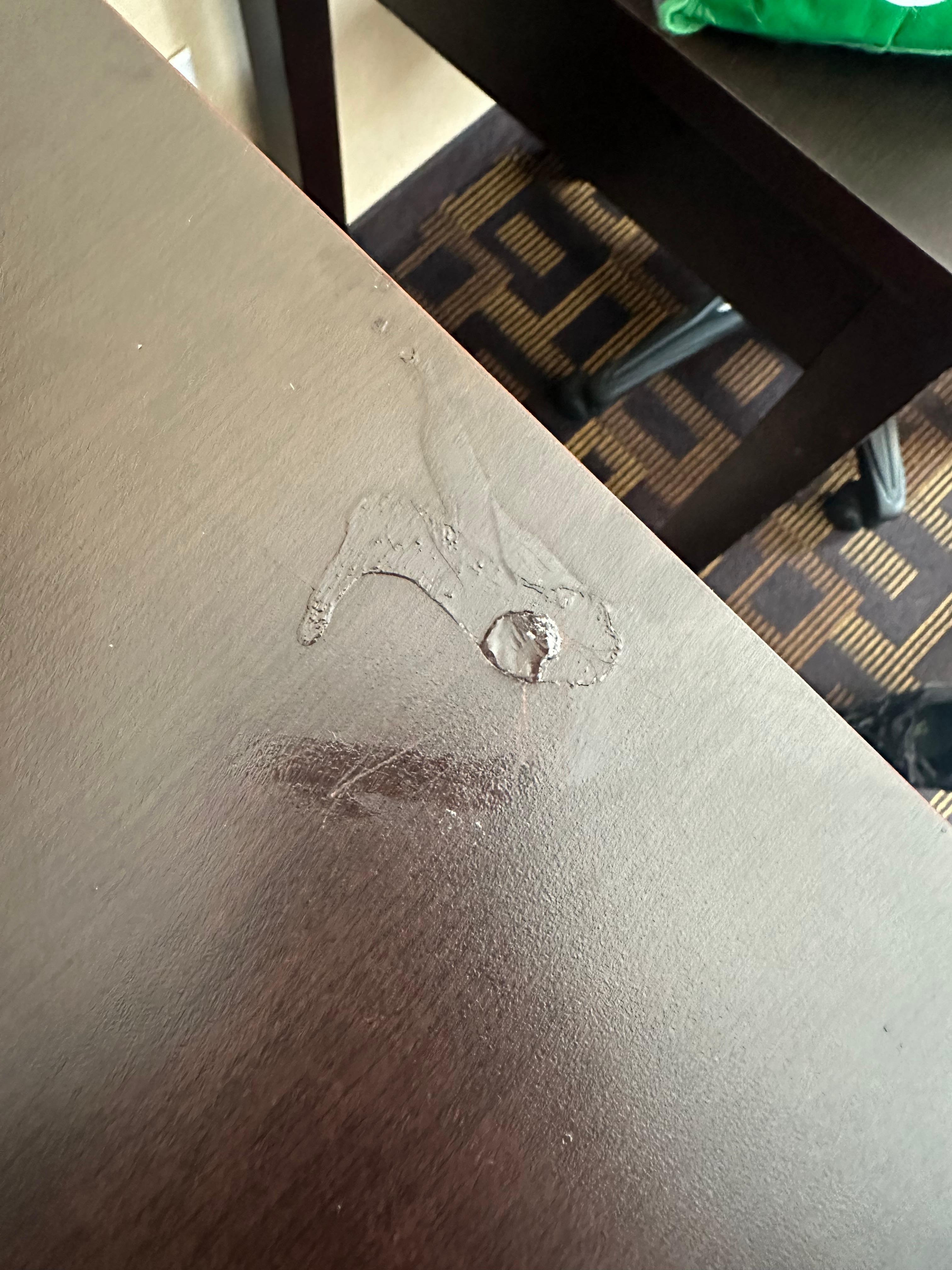 Glue or something, pictures taken when we first got into the room 