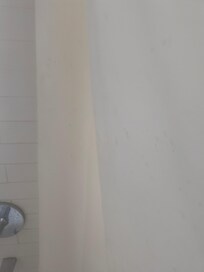 Shower curtain with spots