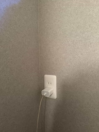 The shower area also has charging stations and a hair dryer available, which is very convenient.
