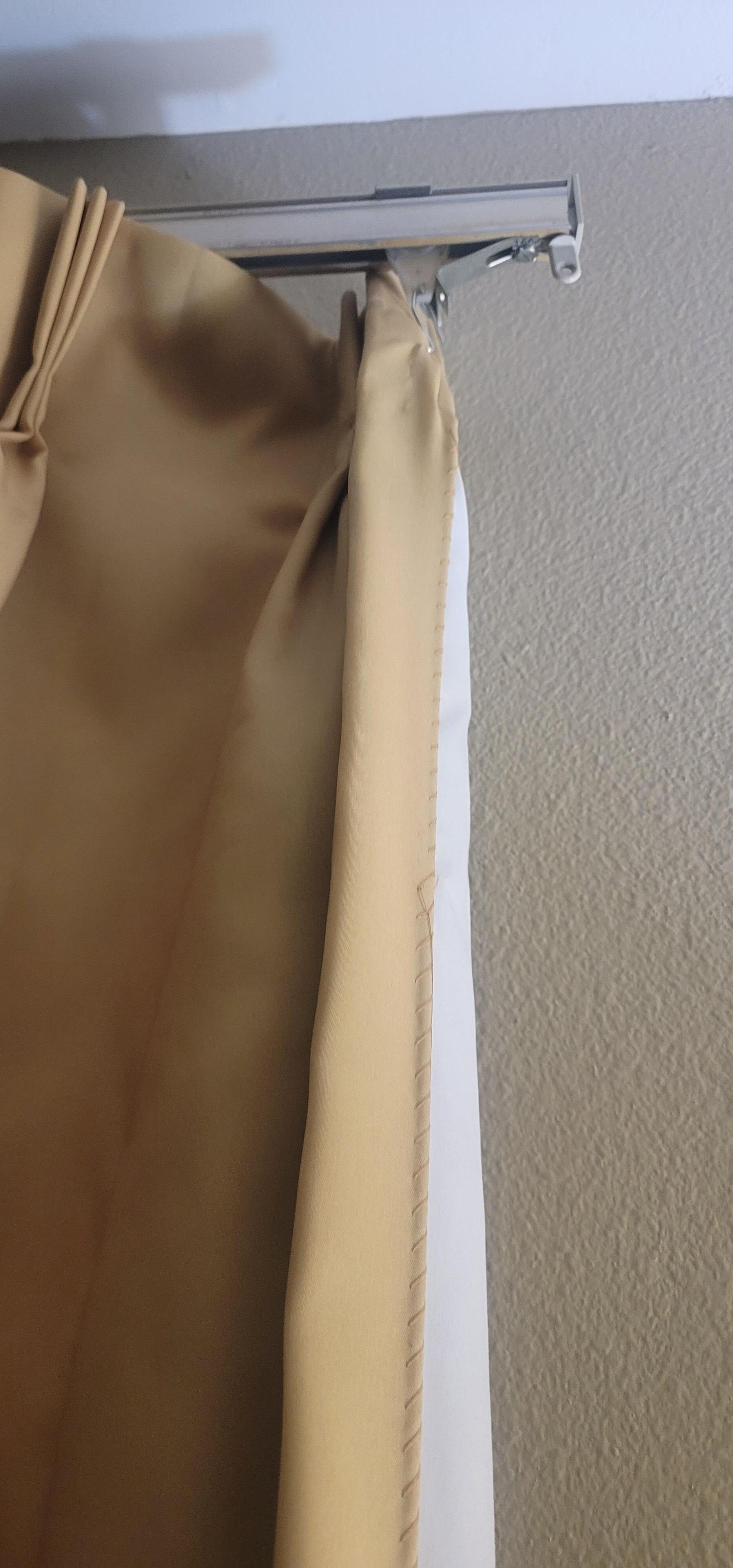 The curtains in every room seem to be broken like this
