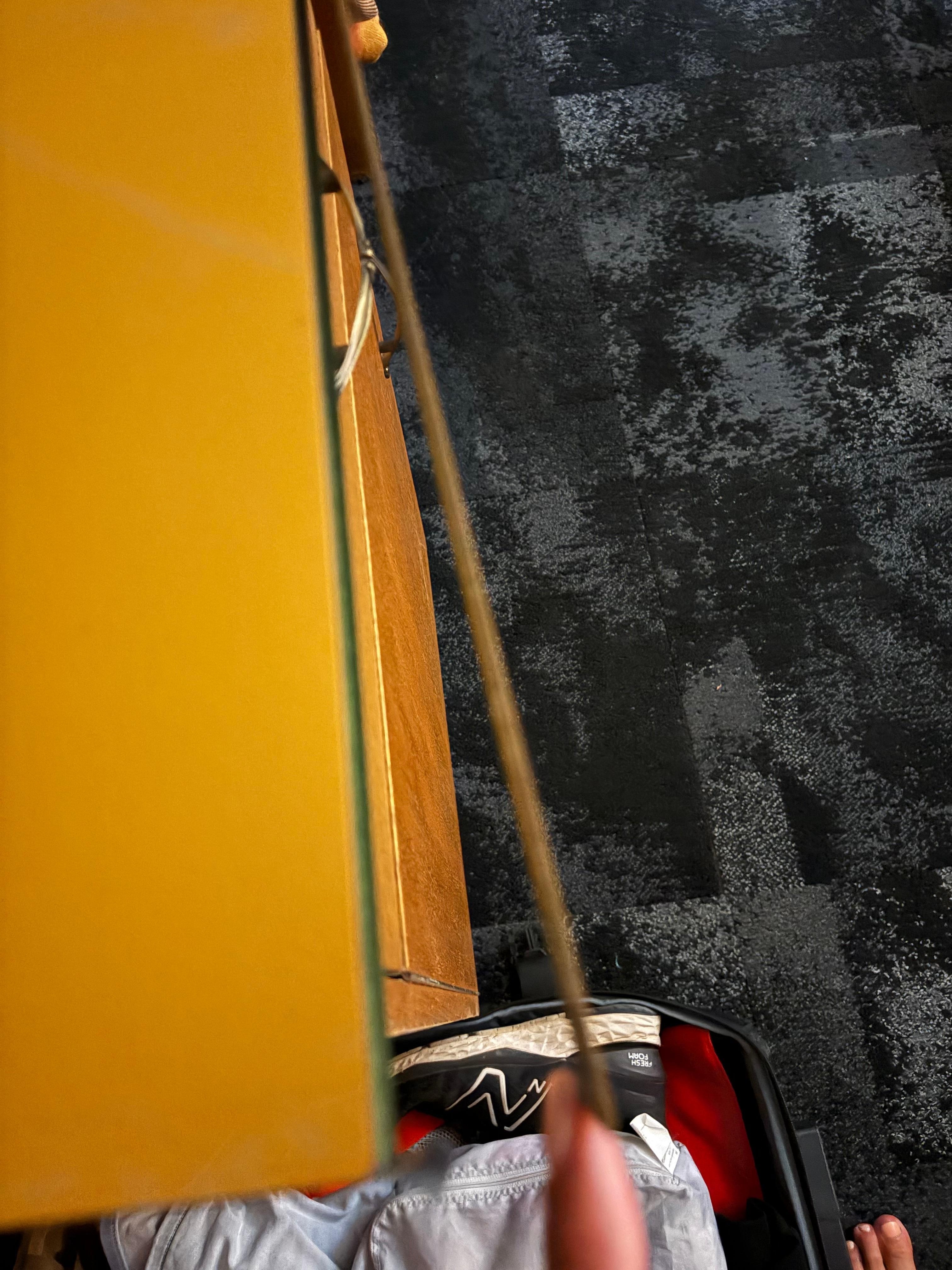 Peeling cabinetry which scratches my leg walking past it