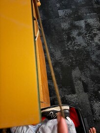 Peeling cabinetry which scratches my leg walking past it