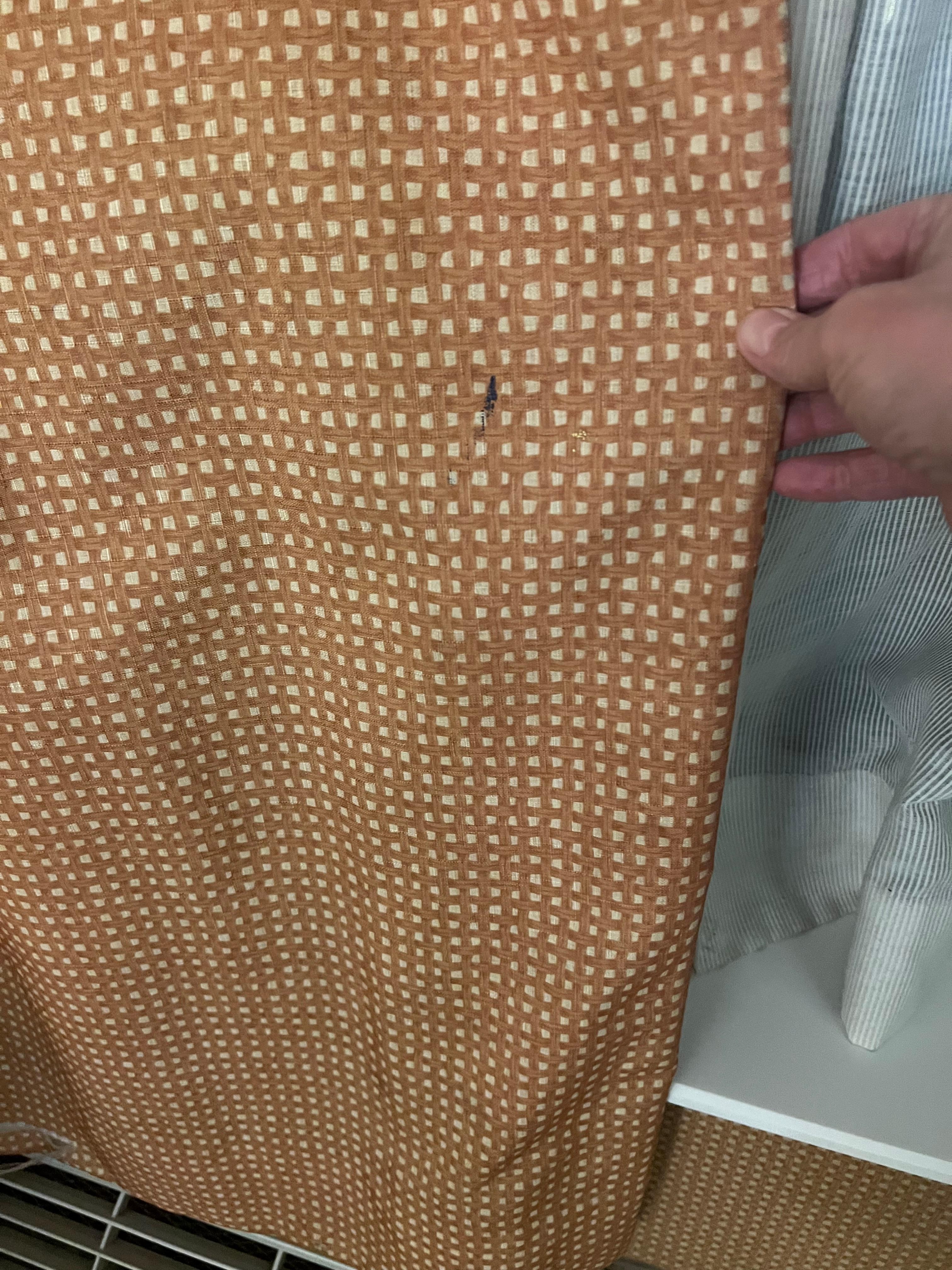 Dirty and cigarette burned curtains
