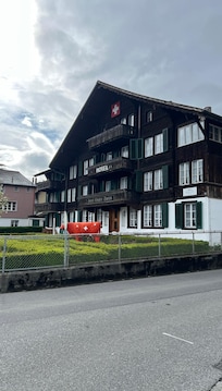 The hotel. Check-in is in the back of this building.