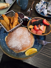 Pancake breakfast from Little Chief within the hotel.
Pancakes were very filling, fruit was fresh, and hashbrown wedges were crispy and well seasoned.