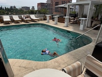 Pool with adjacent hot tub