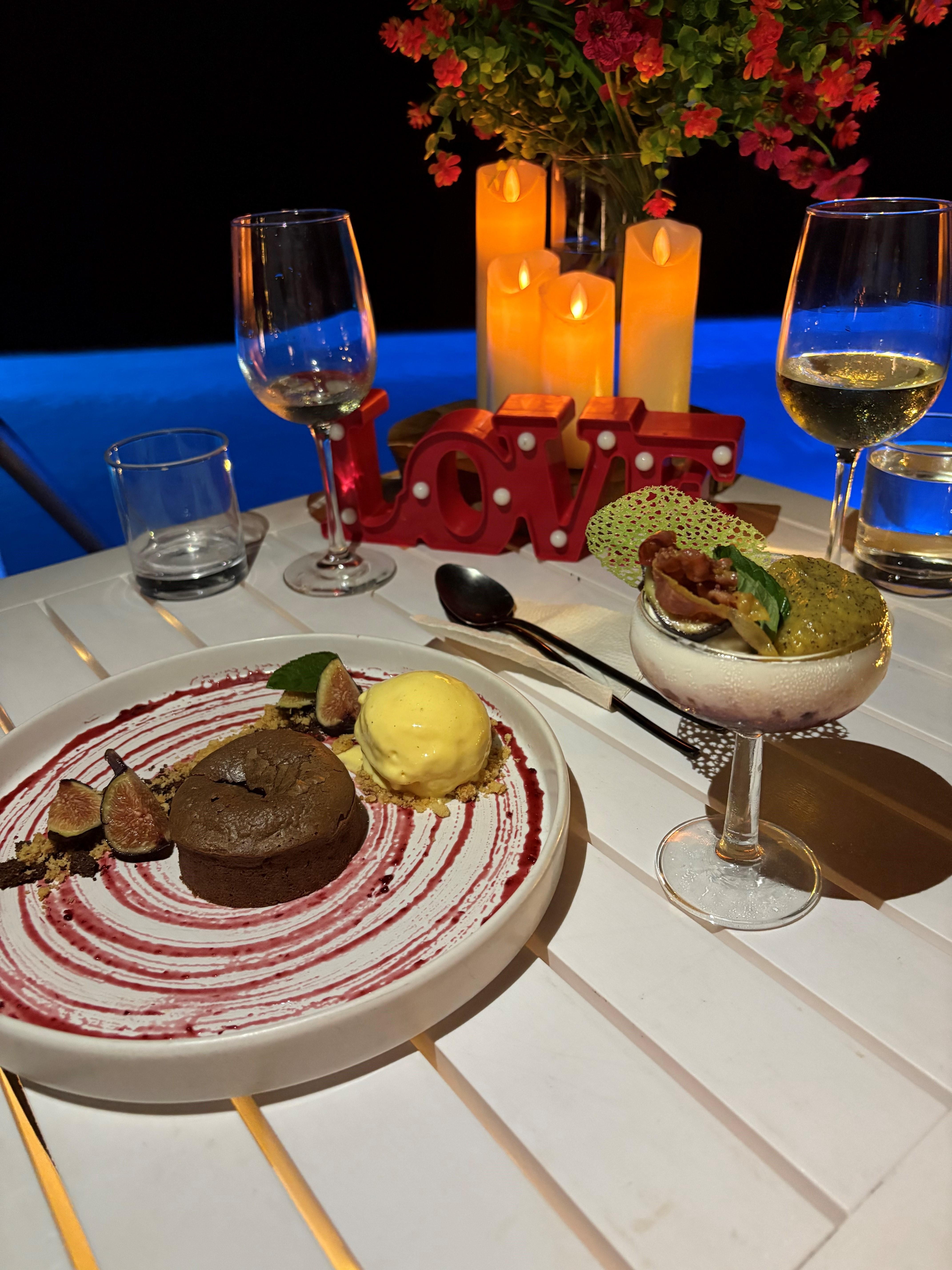 Rooftop poolside engagement dinner.
