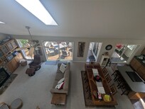 View from the loft. 2 bunk beds and a bedroom up here are open to the living room.