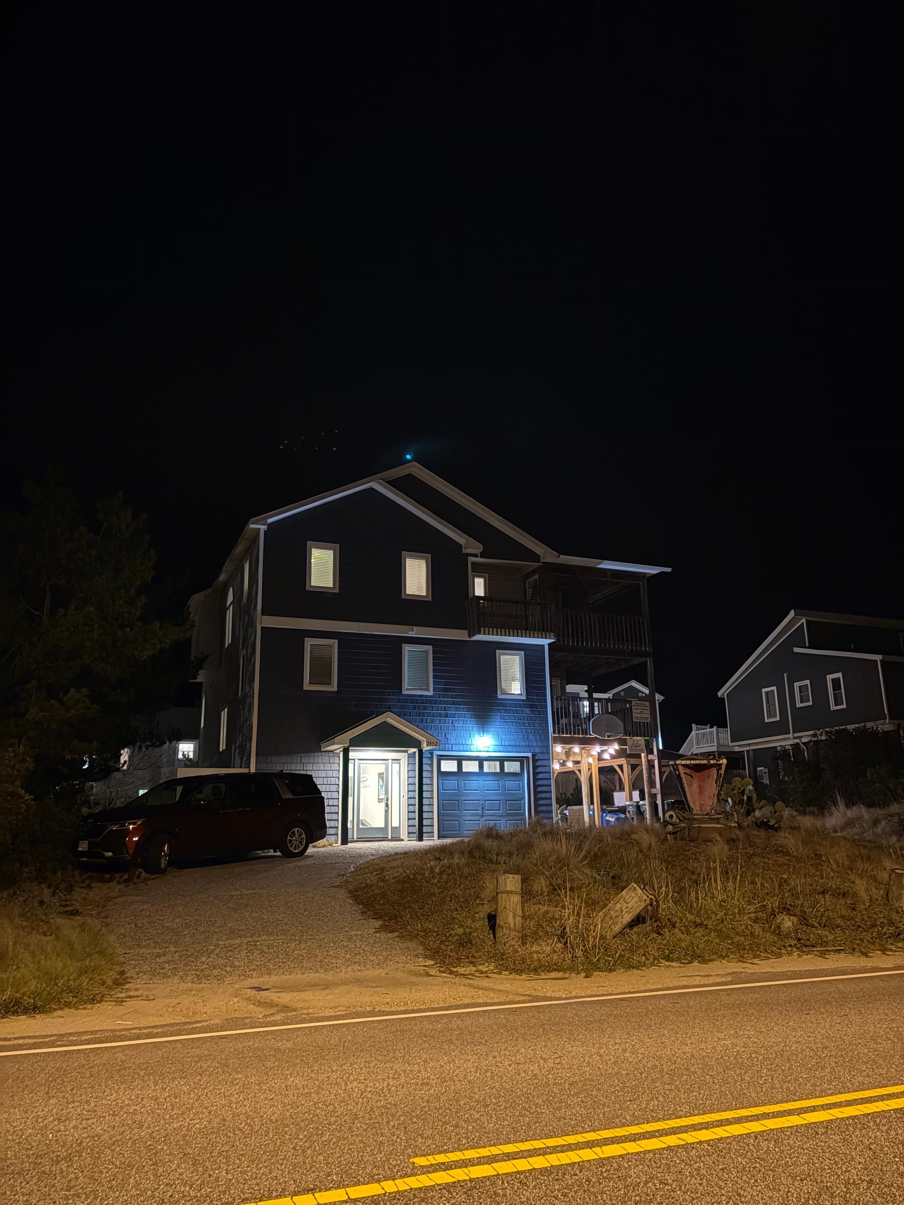 Night time view of property