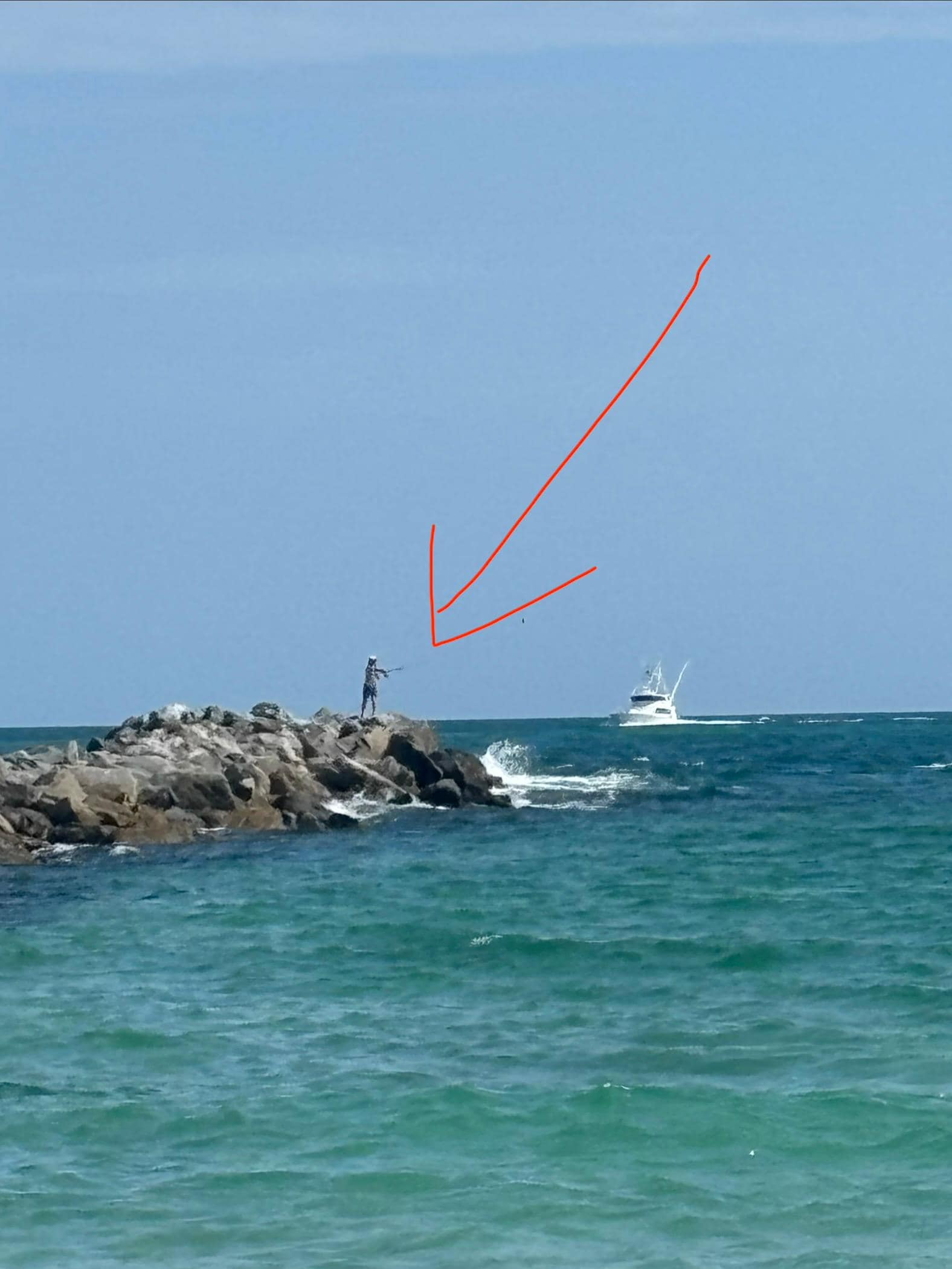 My son fishing the Jetty