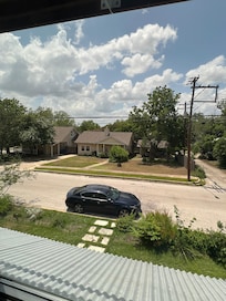 Comfy upstairs bedroom supplied with quilted fabrics