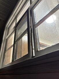 First thing we saw. Window is off set, broken and wonât close.