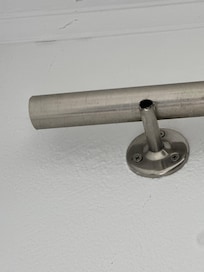 Large curtain rod not attached/broken