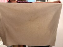 One of the stained white towels - which was denied to exist by the host because their "cleaner said so".