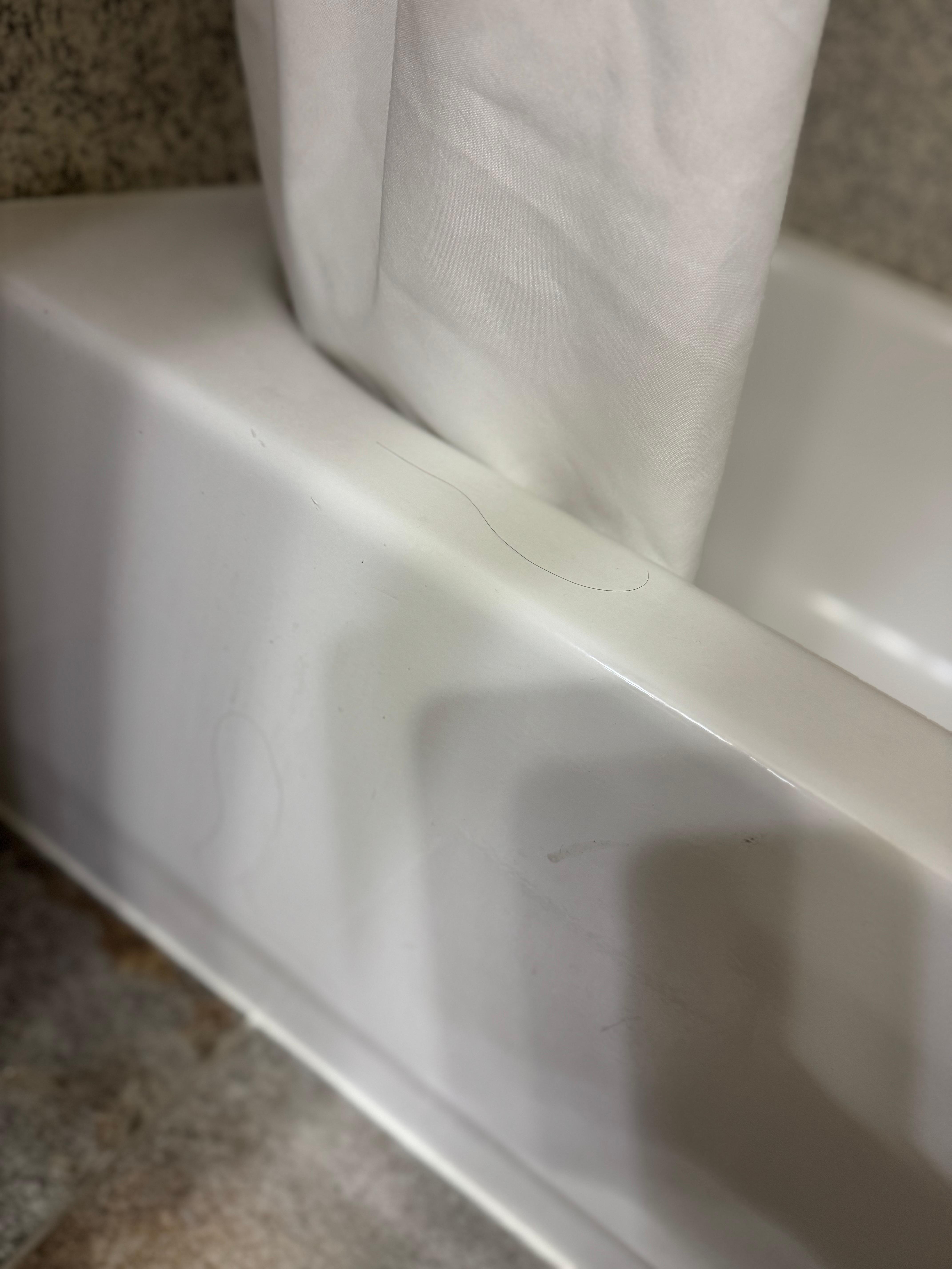 Hairs sticking outside bathtub