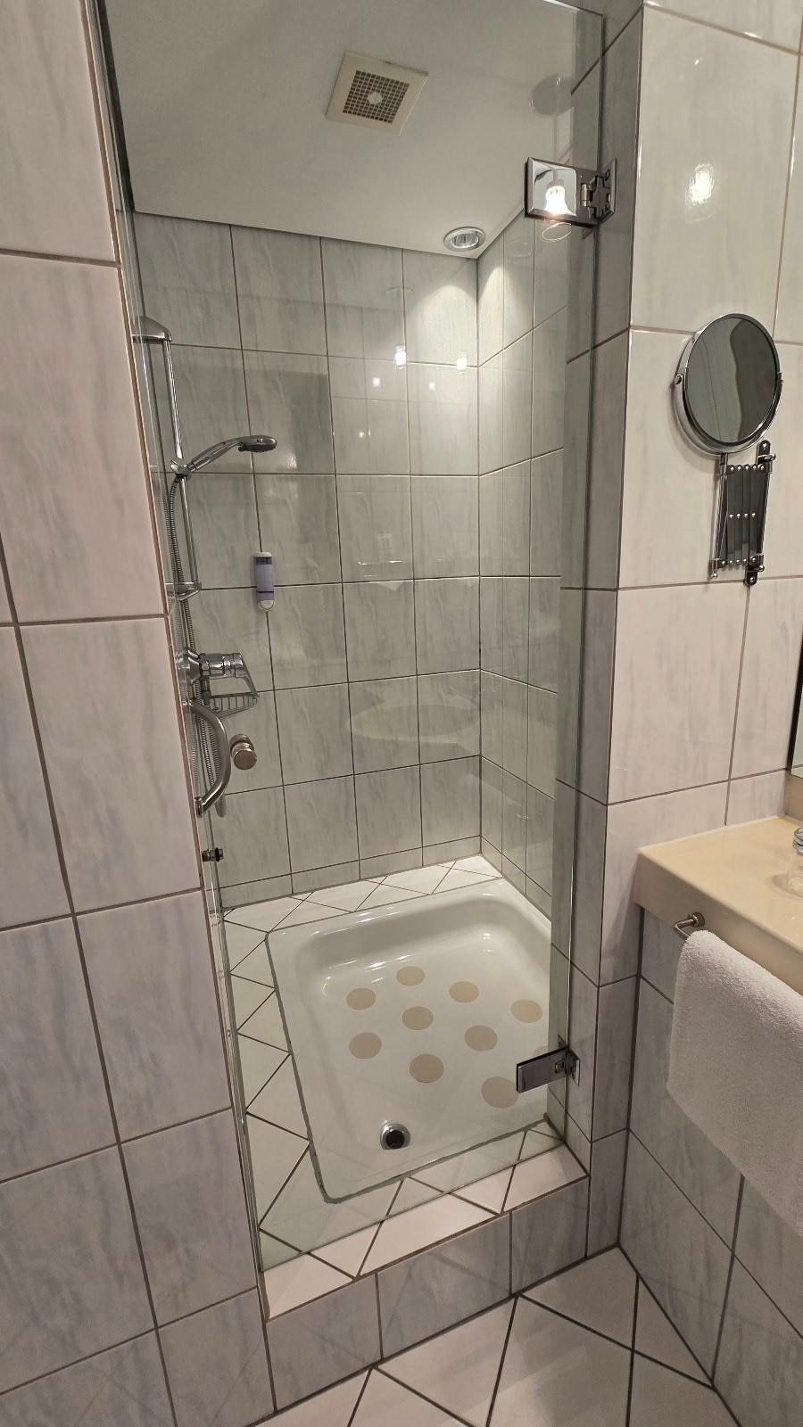 Powerful shower.  Floor is strange but it works.