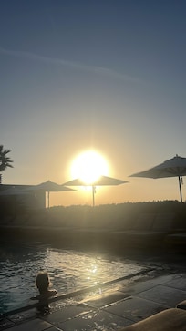 Sunrise by the rooftop pool