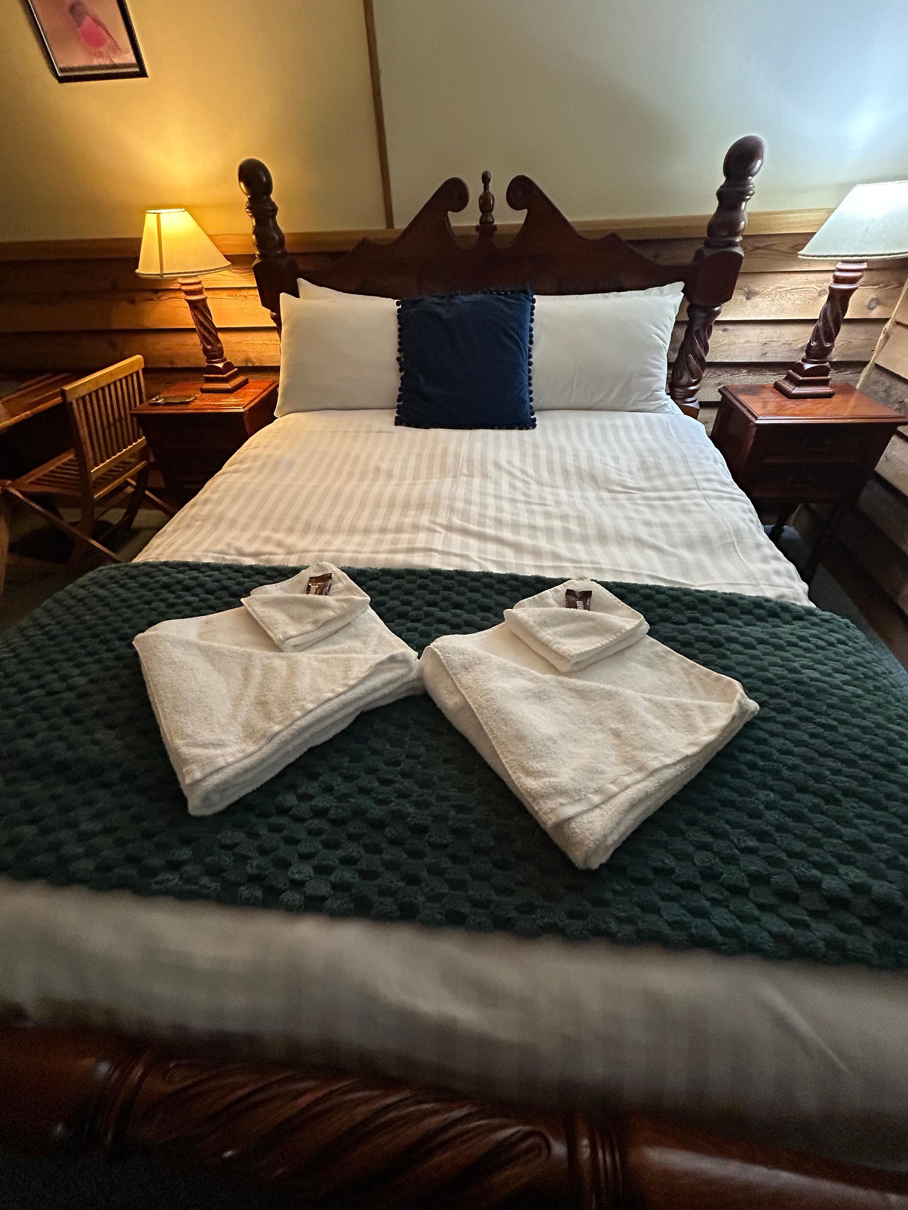 Loved the little touches- towels on bed, chocolate. 