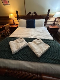 Loved the little touches- towels on bed, chocolate.