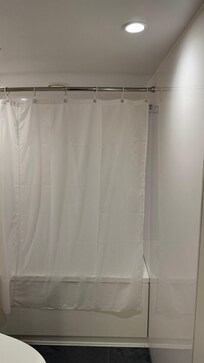 Tub was tiny. Approximately 4.5 feet (137 cm) long.