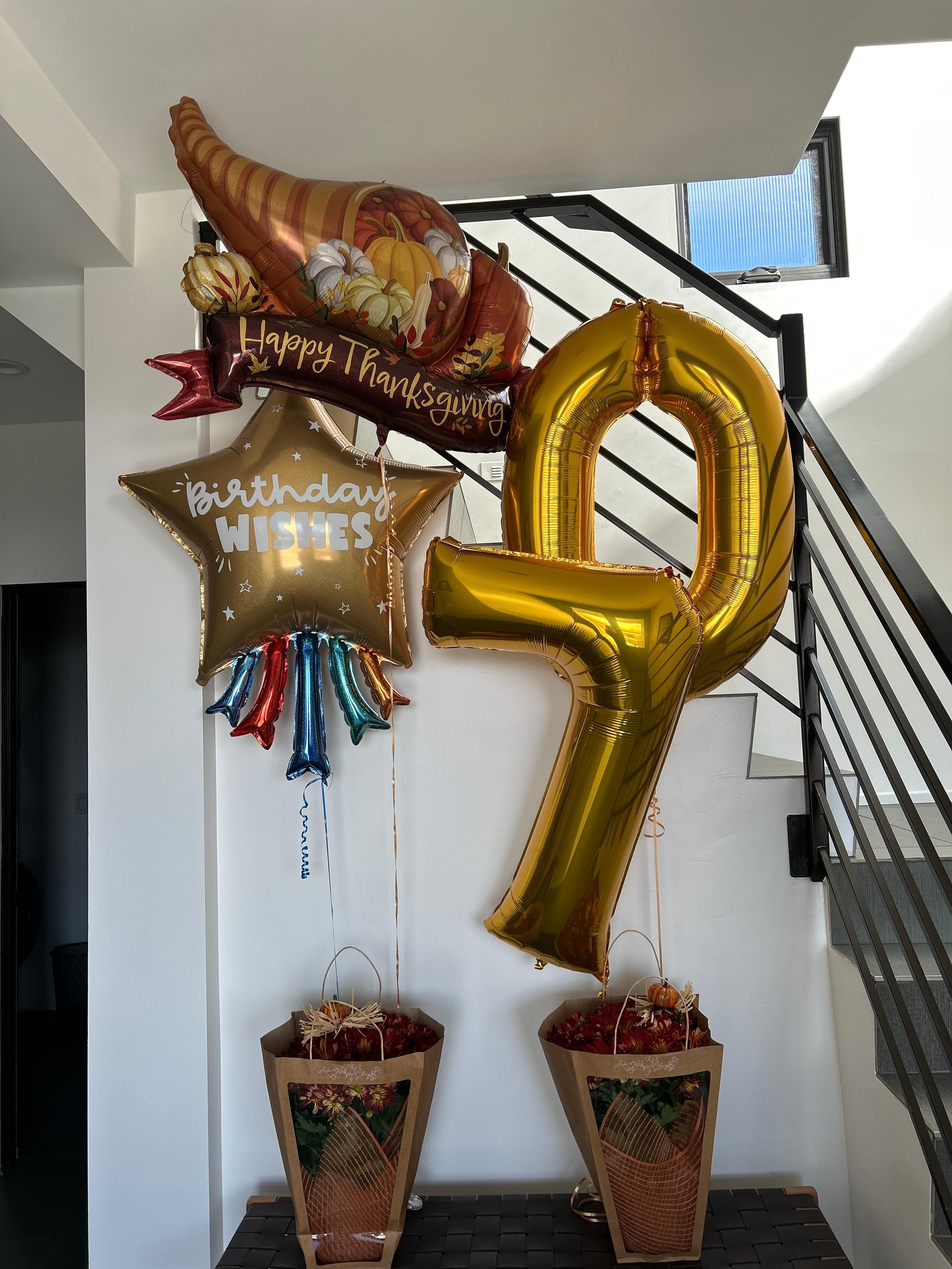 My ‘happy 70th bday’ and Thanksgiving welcome balloons. 