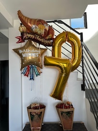 My ‘happy 70th bday’ and Thanksgiving welcome balloons.