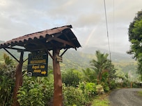 In front of the entrance to the lodge