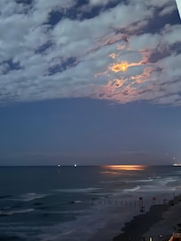 All photos taken from our balcony. Space X lighting up the sky!