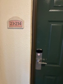 This is my neighbor door directly beside us and that’s how the door is supposed to look as you can see everything is intact. The key fob works for them.