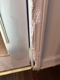 Door molding ripped and repaired with foam or something