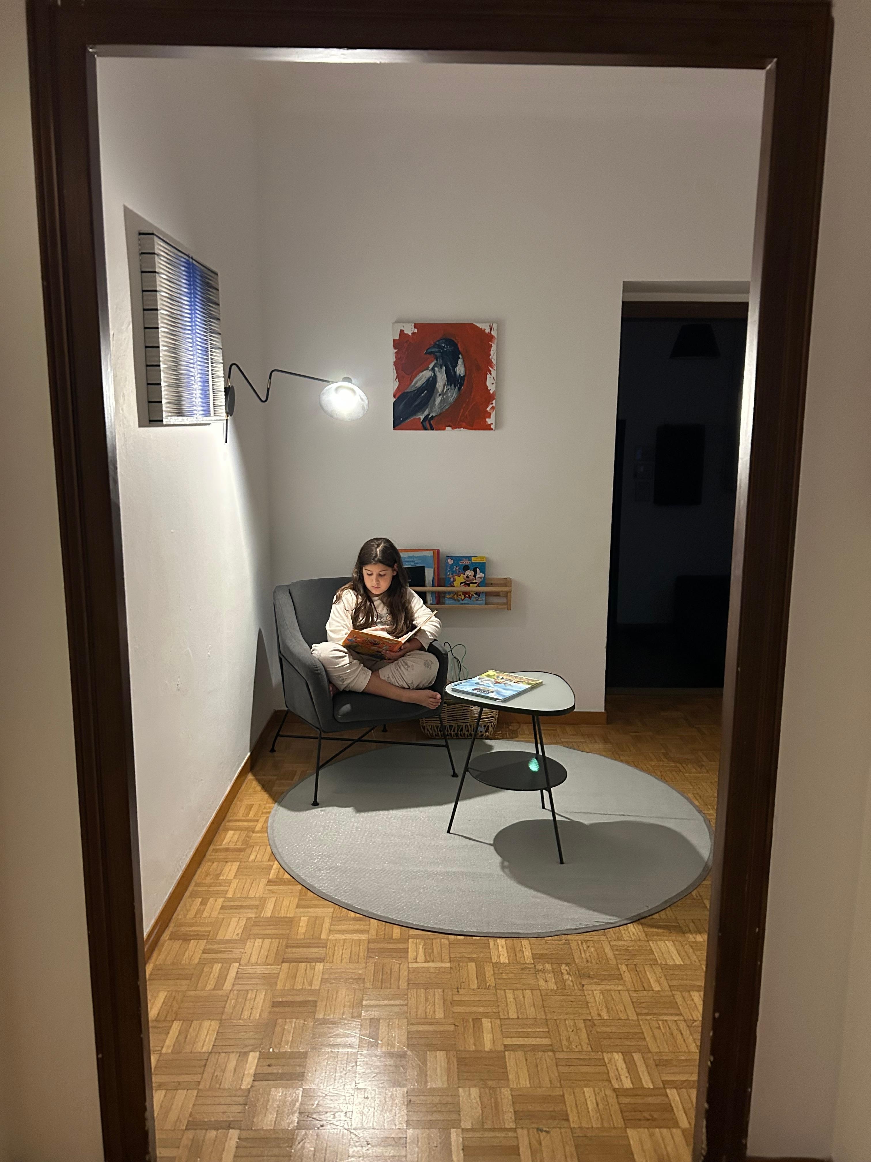 Sweet reading nook. Complete with kids books and toys. 