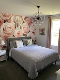 Rose bedroom with Queen bed.