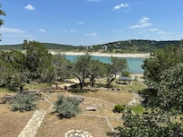 Lake nowhere near the lounge chairs as shown in listing