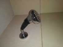 Taped on? Really.....
Drop 20$ on a new showerhead