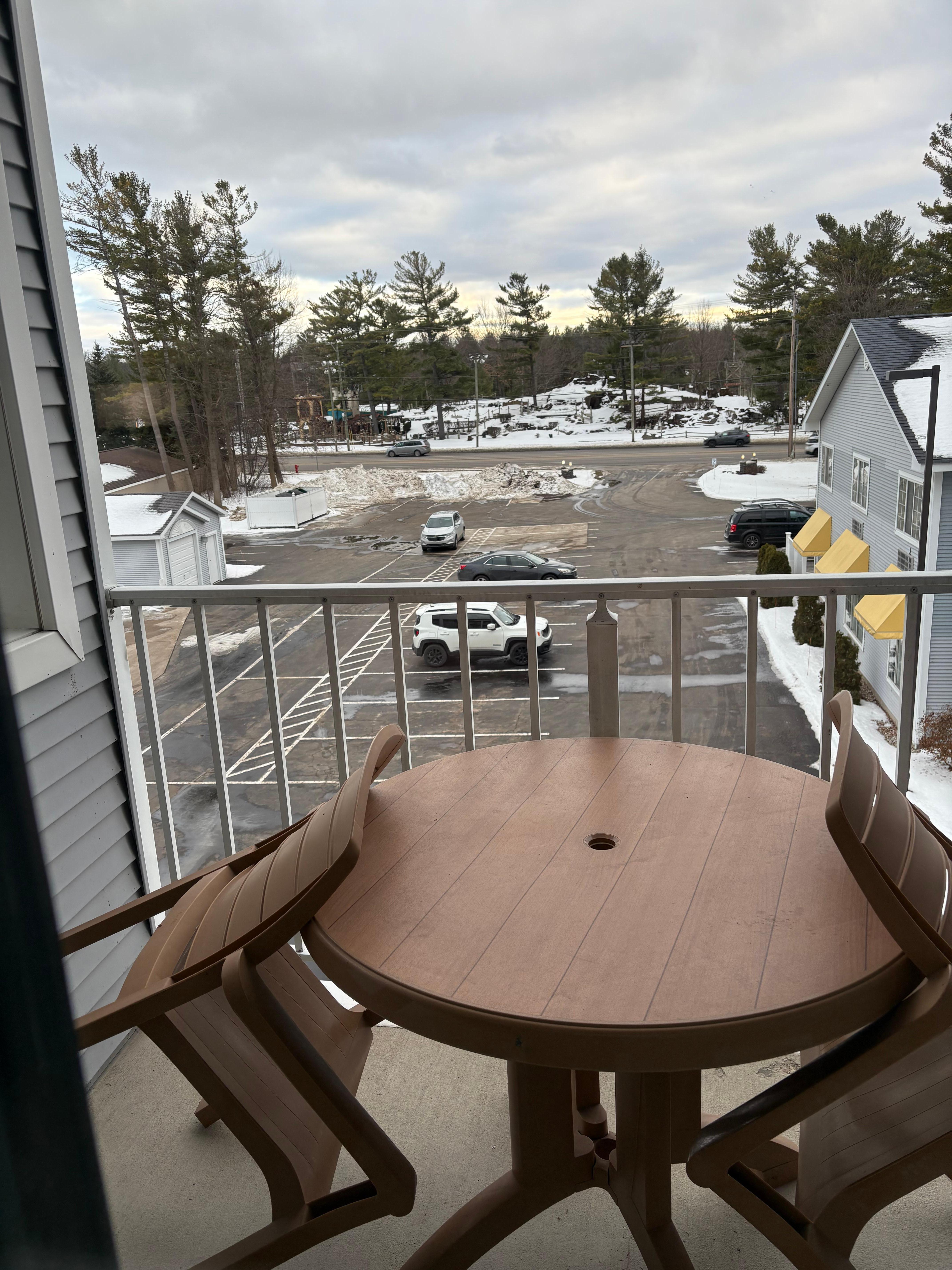 A view from our room. A cute table & chair for the summer.