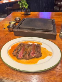 Having at steak at Prime House