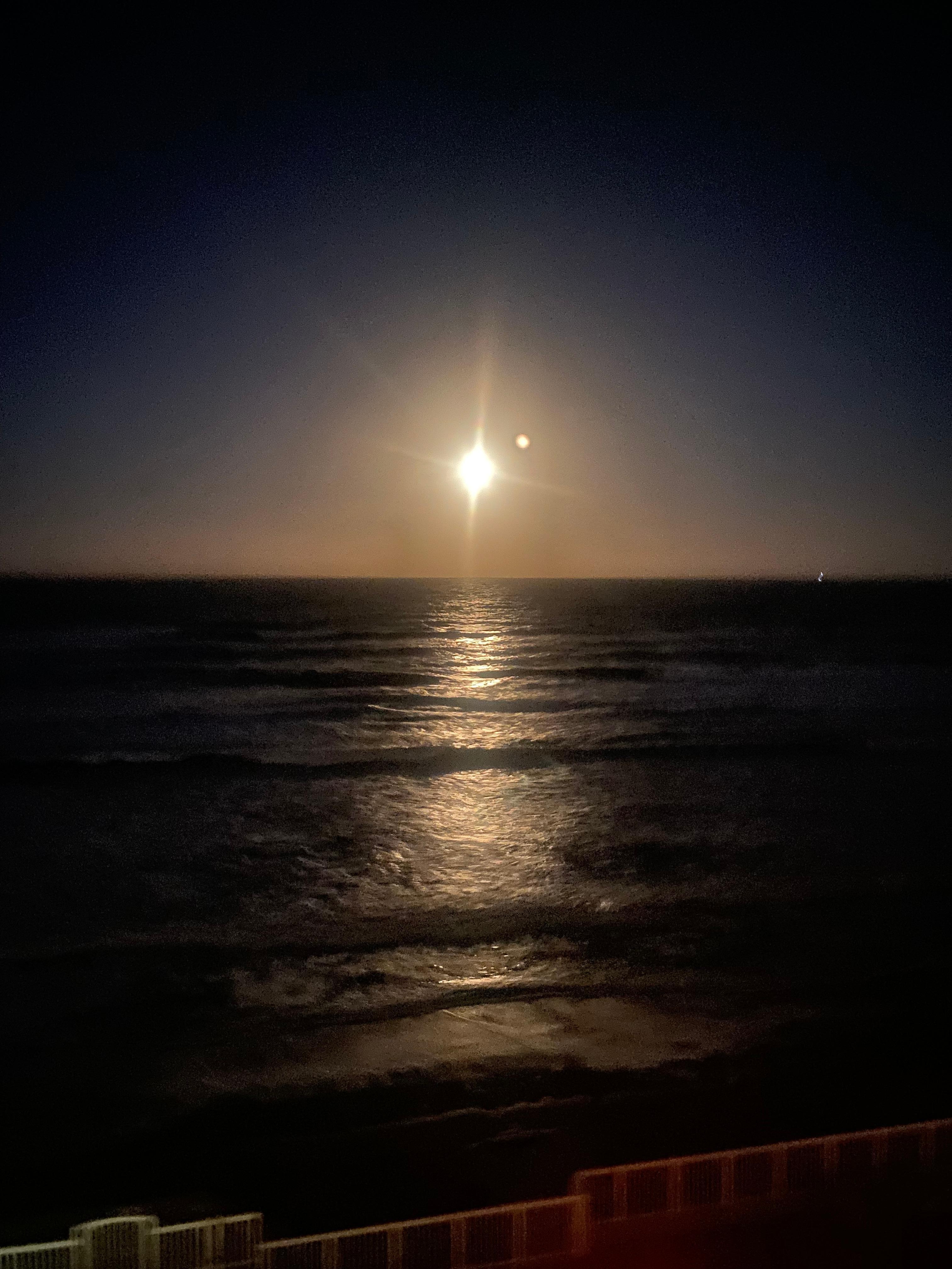 Full moon over the ocean. 