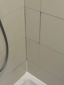 Example of cracked tiles and shower