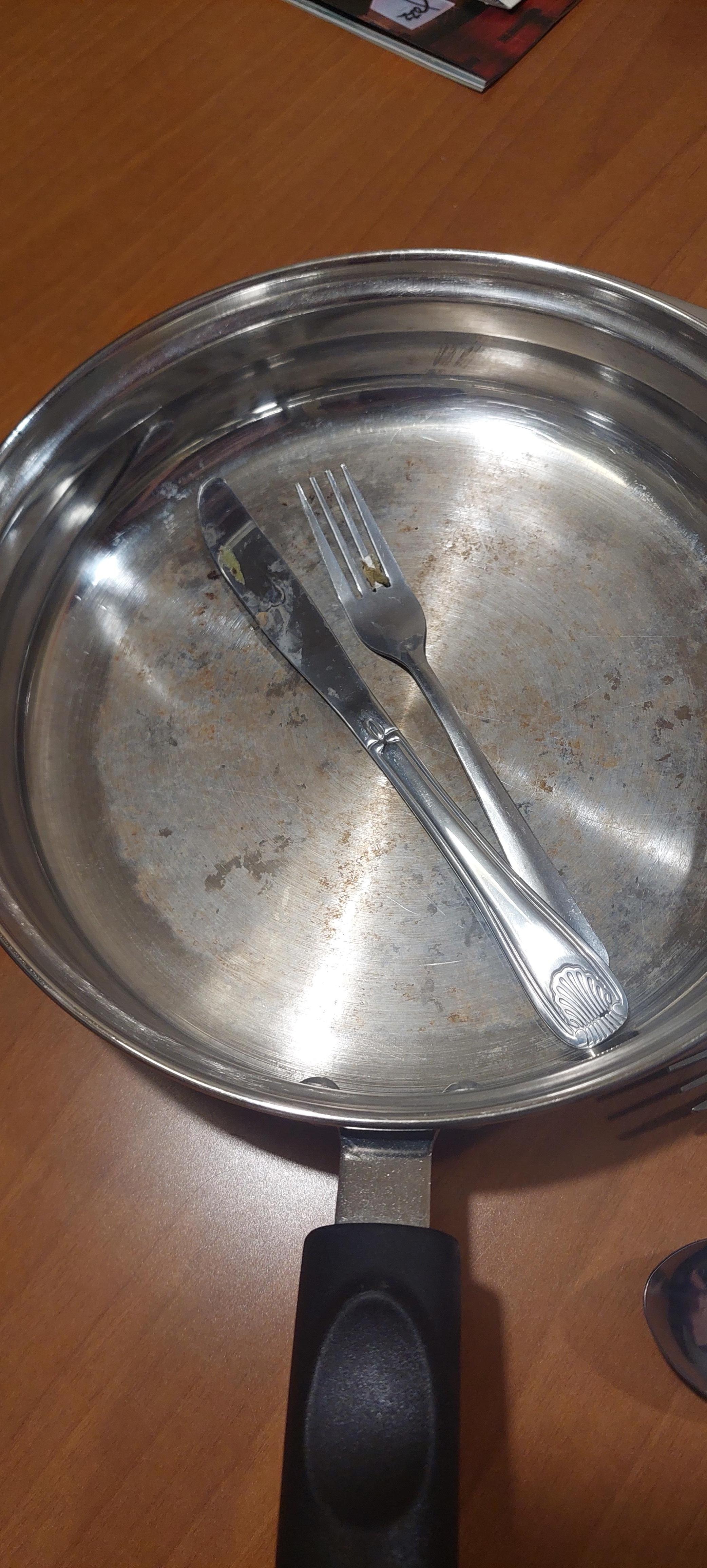 the "replacement" pot with same silverware they didn't replace