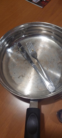 the "replacement" pot with same silverware they didn't replace