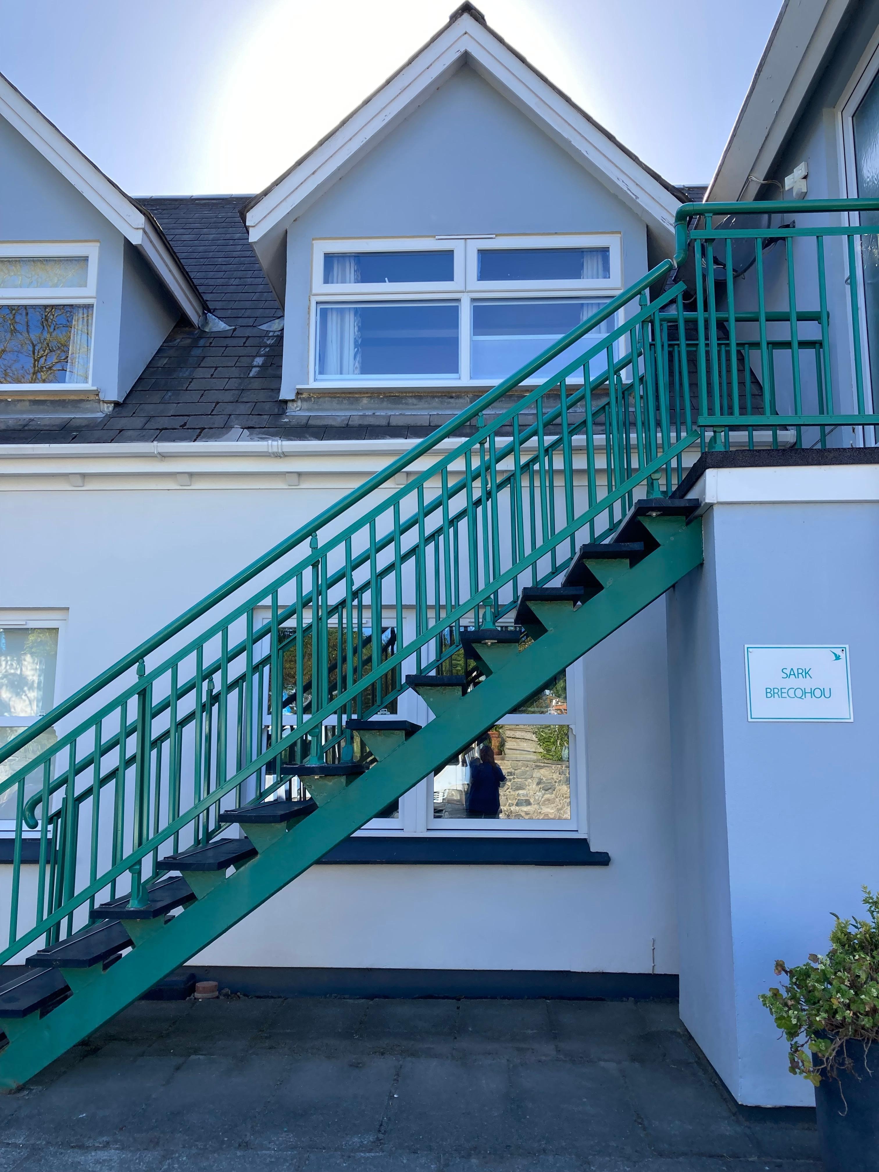 The duplex, lounge and kitchen upstairs, bedroom downstairs. 