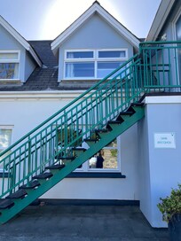 The duplex, lounge and kitchen upstairs, bedroom downstairs.
