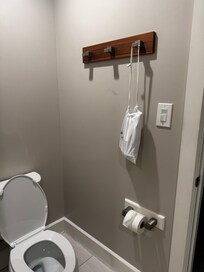 Only place to hang towels or robe after shower next to the toilet
