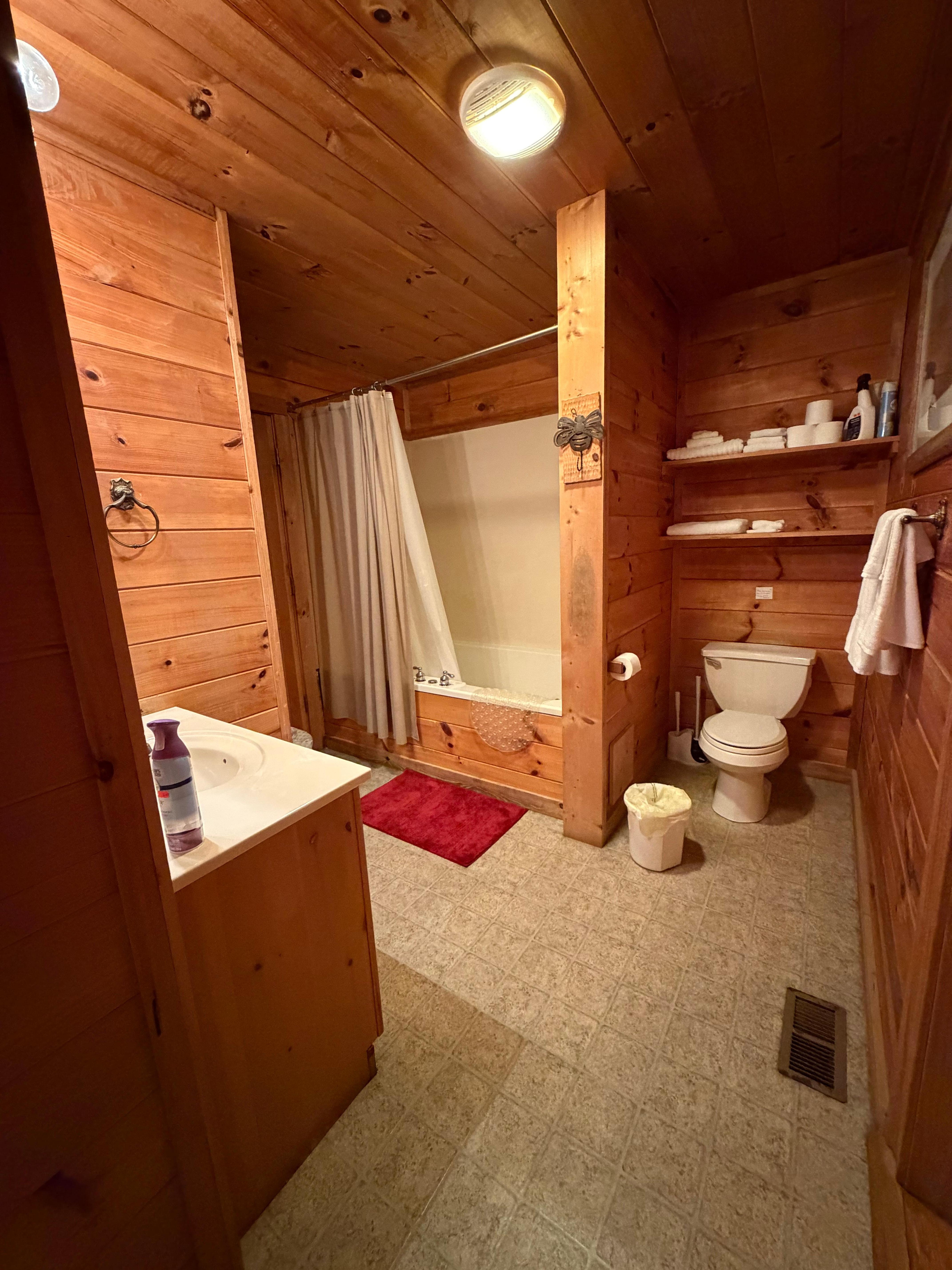 The bathroom is downstairs off the kitchen