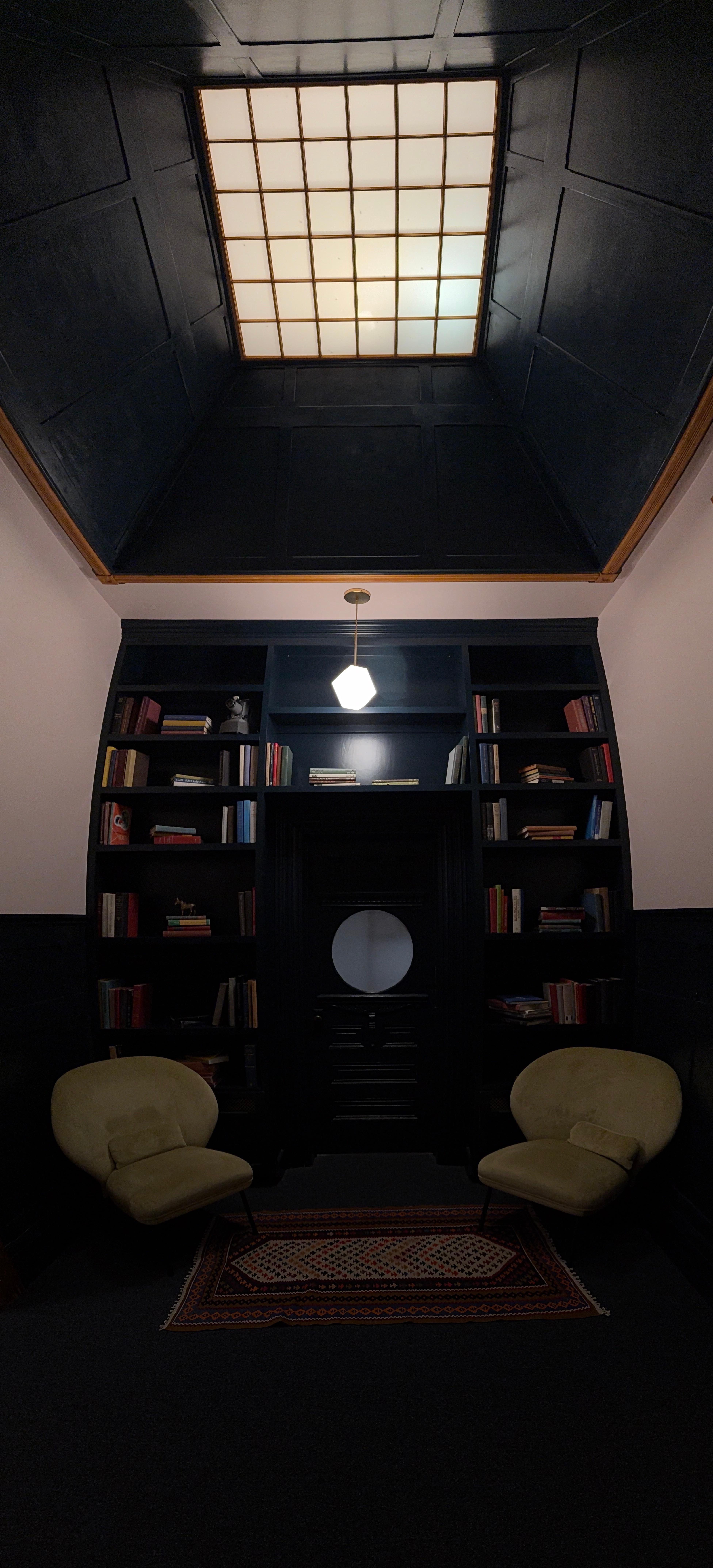 The upstairs reading area right before you go into your room.  