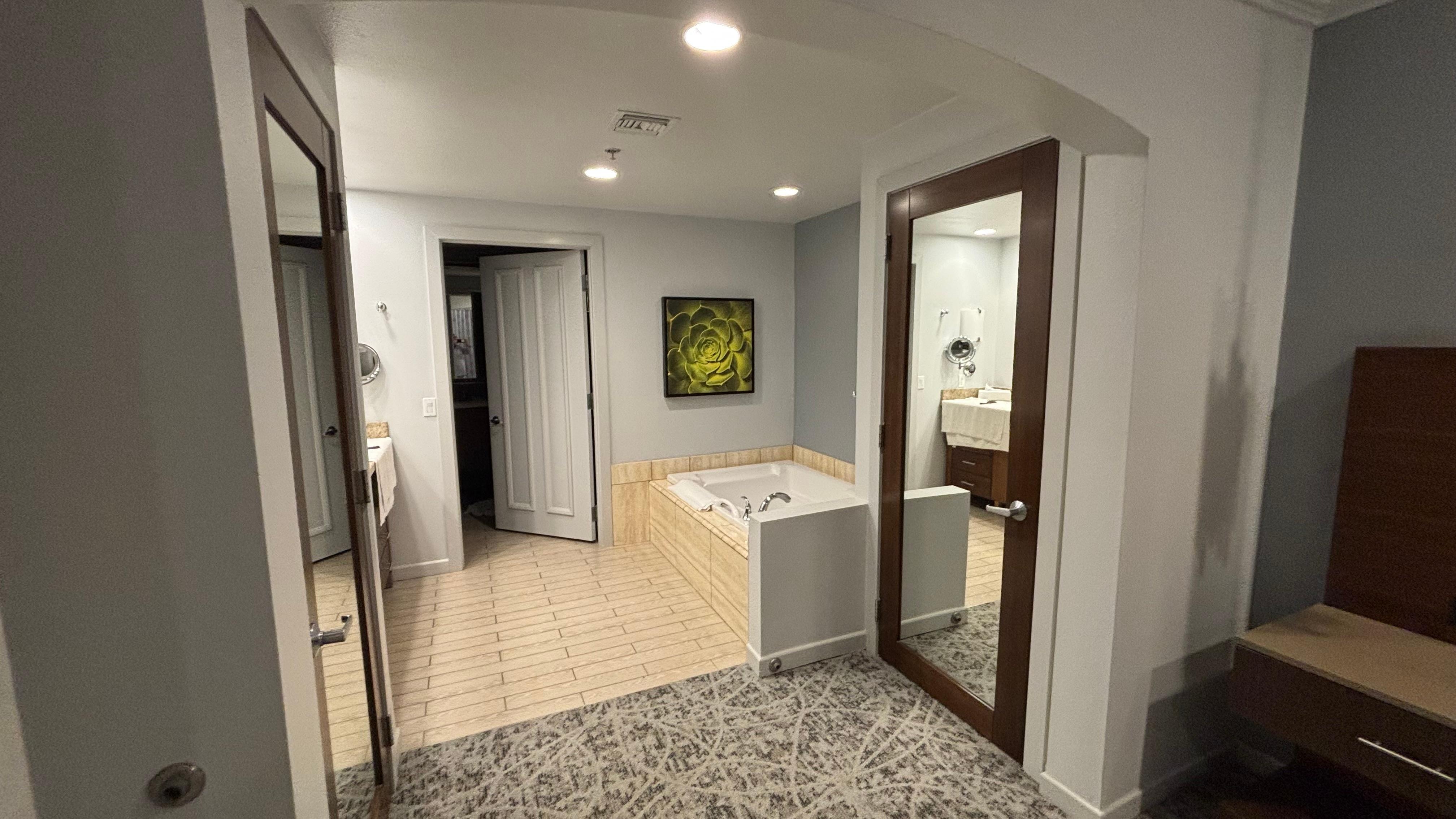 Tub, shower also in Bathroom