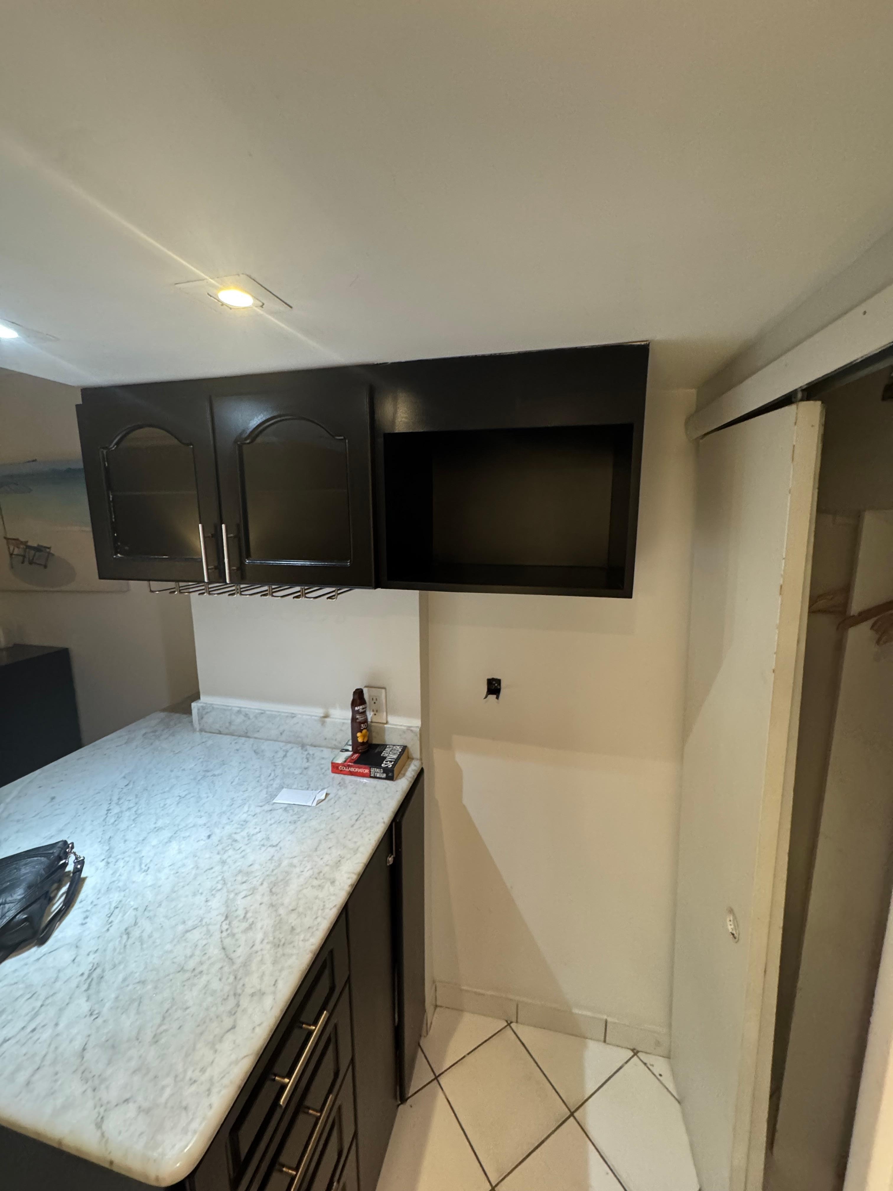 Kitchen, no sink or microwave.